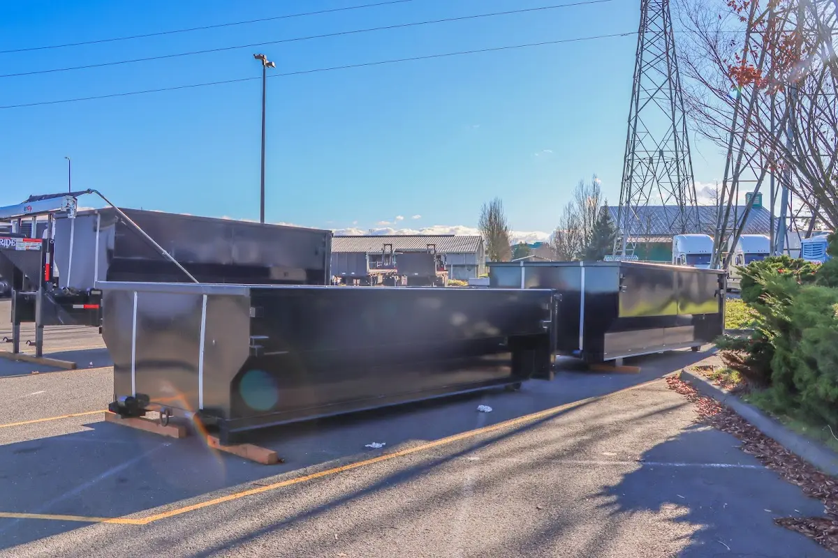 Roll-off dumpster ready for waste disposal at job site for Roofing Dumpster Rental in Douglas
